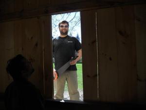 Bill cutting through the wall to install my window.