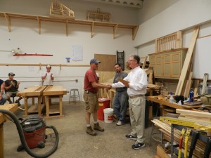 Johnathan Ericson handing out his Attendance Awards / Scholarship
