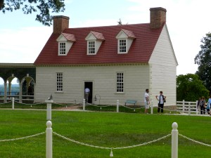 Note the transition from Rustication back to beaded claps on the side of this secondary building