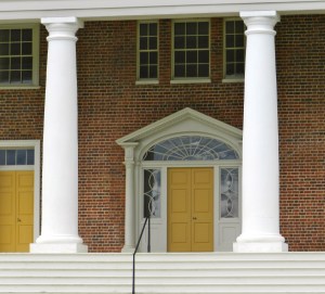 Front door flanked by columns