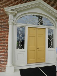 The side lights flanking the door can lower into recessed pockets to promote air flow