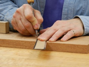 Demonstrating how to make the first cuts