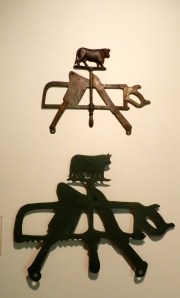 Trade signs for a butcher shop were about as literal as you can get. 