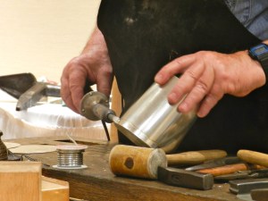 Soldering a tin cup