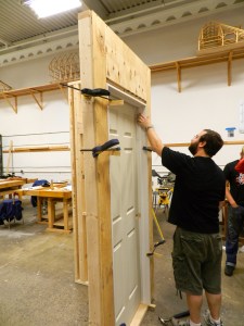 Bill demonstrating how to adjust the door's opening