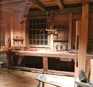 Nice long joiner's bench. Chisel racks in the wall and nice big windows to provide light to work by..