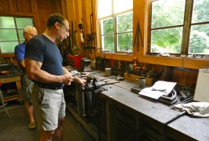 Peter teaching the class how to file and use the leg vise