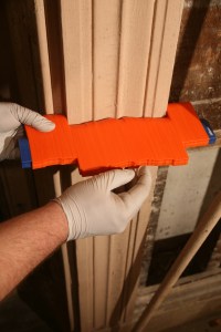 Using a molding comb to capture the profile. (Photo courtesy of the Taunton Press)