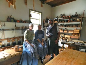 Interpreters in the Joiner's workshop inside the Single Brother's House Shop