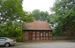 A half-timbered home. (A timber frame home where the timbers are exposed inside and out and infilled in between)