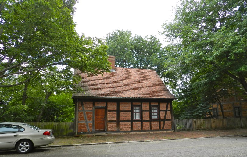 A half-timbered home. (A timber frame home where the timbers are exposed inside and out and infilled in between)