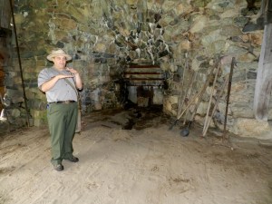 Ranger Curtis White explaining how the ironworks produced iron