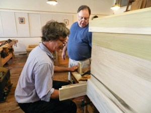 Roy helping a student