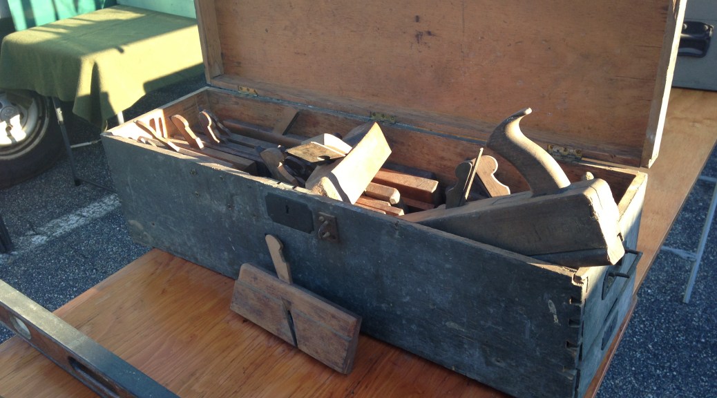 Old dovetailed tool chest full of molding planes