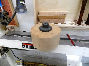 Bowl blank cut out on band saw and mounted to faceplate