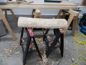 Remove any remaining bark with the hatchet