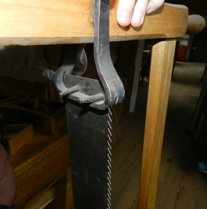 Close up detail of the pins the secure the blade to the frame