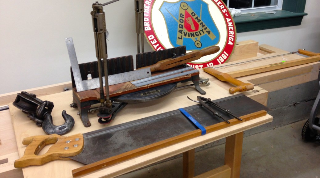 My finds this year -- Stanley 358 Miter Box _ Disston Saw, Carpenter and Joiner's Union Sign, Starret Rules and Dividers, Mini Framing Square, ECE Frame Saw, Heavy Duty Snatch Block, Auger Bit Handle