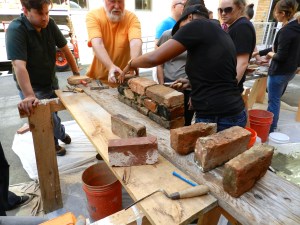 Dierdre building a brick wall