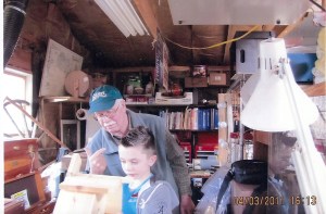 James A. Clarke sharing his love for woodworking with the next generation.