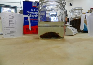 Flakes dissolving in the alcohol