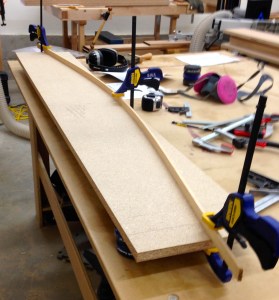 Using a fairing stick to lay out the curve for the headboard and templates