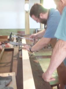 Making the miters with a miter box. (Photo by Carol Coutinho)