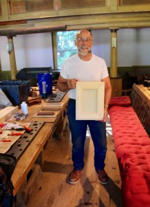 Tom with his finished picture frame.