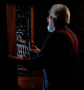 Don Williams gazing upon the Studley Tool Cabinet (Photo by Narayan Nayar and linked from http://www.studleytoolchest.com/)