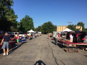 The first of three aisles of vendors out in the parking lot. 