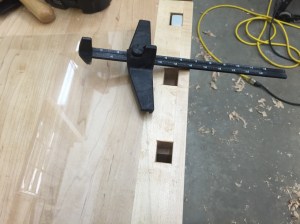 Cutting a strip of glass