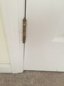 Example of lower left side of door rubbing as door sagged. 