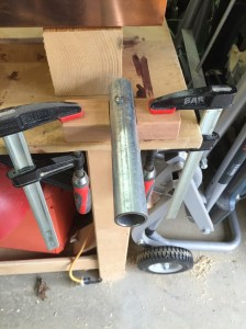 Bench mounted anvil for clinching the copper tacks. 