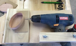 Using the drilling jig to make holes for the pins