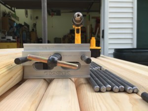 Doweling jig used to center and guide holes drilled into the end of the posts.