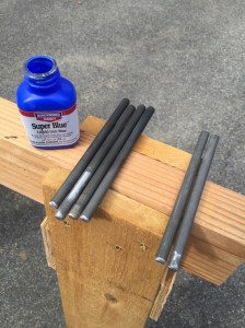 Using Gun Blue to give the the rods a black patina. 