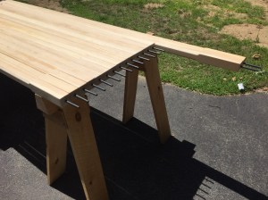 Rods glued and inserted into the ends of the poles. 