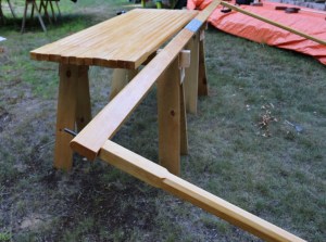 Insert the 9' poles into the center beam. 