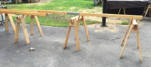 Fitting the metal connector to support the top beams. 