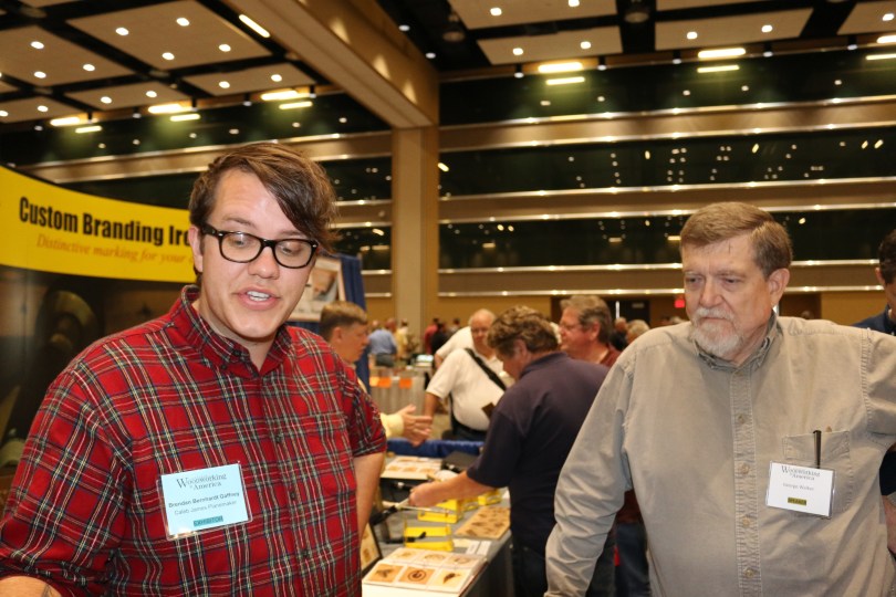 Brendan Bernhardt Gaffney and George walker looking at Brendan's new sector prototype.