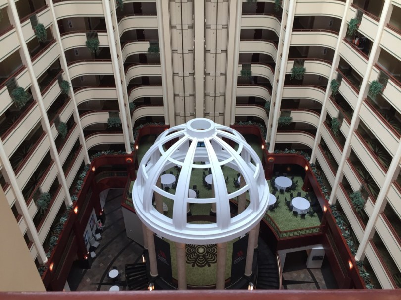 Inside of the hotel lobby. A very big open space