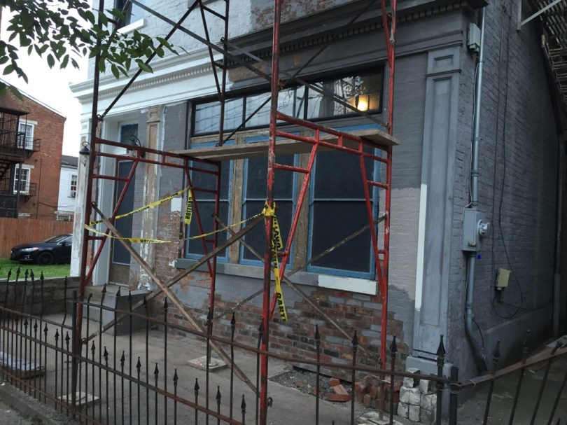 Pig sticker fence. I also really like how the guy restoring this row house painted the CDX on the door to look like a door and even layered it on the windows and painted them to look a bit like sash. Nice touch.