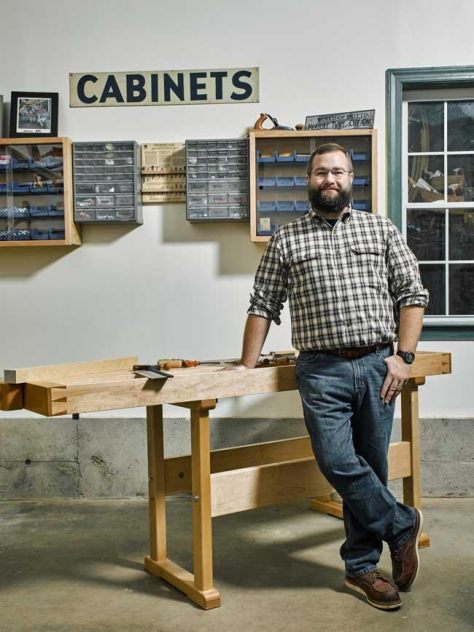Bill standing next to his Tage Frid inspired workbench. (Photo by Doug Levy, 2016 http://douglaslevyphotography.com )