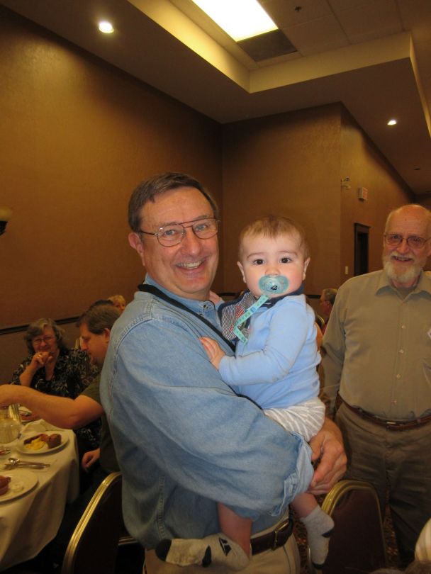 Paul Van Pernis at the EAIA Annual Meeting 2015 holding my son Bradley. :-)